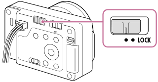 Ilustração que indica a posição do interruptor LOCK