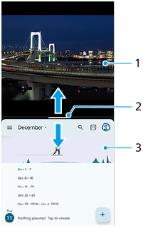Billede af delt skærm og komponenter, der viser hver del med nummer. Øverste halvdel, 1. Partitionslinje, 2. Nederste halvdel, 3.
