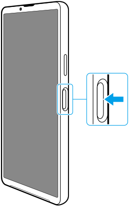 正面図、右側面の電源ボタンを示した図。