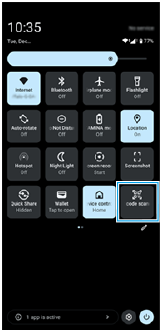 Imagine care afișează [Scanner de coduri QR] în panoul Setări rapide.
