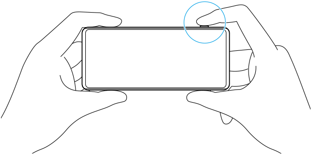 Imagen que muestra cómo sujetar el dispositivo mientras se toma una imagen utilizando Photo Pro
