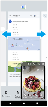 Bilde som viser hvor du sveiper for å velge appen du vil vise i fullskjerm i popup-vindusmodus