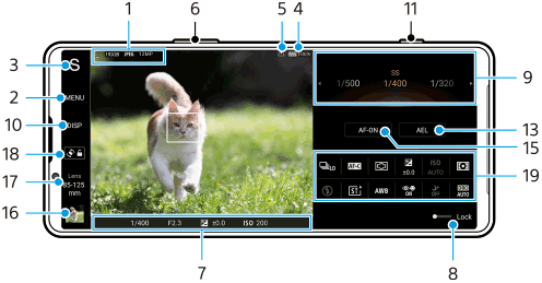 Obraz przedstawiający lokalizację poszczególnych parametrów na ekranie gotowości aplikacji Photo Pro w trybie AUTO/P/S/M w orientacji poziomej. Górna strona urządzenia: 6 i 11. Obszar środkowy: 1, 5 i 4. Obszar po prawej stronie, od góry do dołu: 9, 13, 15 i 19. Dolny obszar: 7 i 8. Obszar po lewej stronie, od dołu do góry: 16 do 18, 10, 2 i 3.