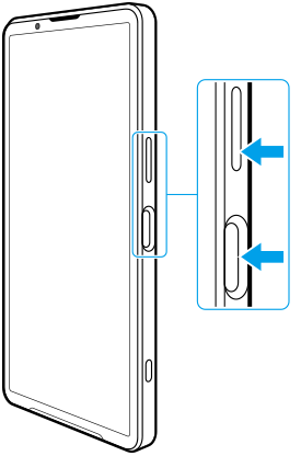 Schéma předního pohledu zobrazující tlačítko snížení hlasitosti a tlačítko napájení na pravé straně.