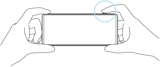 Imagem que mostra como segurar o dispositivo na horizontal enquanto fotografa uma imagem utilizando a aplicação da Câmara