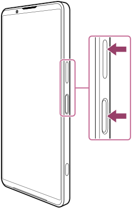 Diagram med enheden vist forfra, der viser lydstyrke op-knappen og afbryderknappen på den højre side.