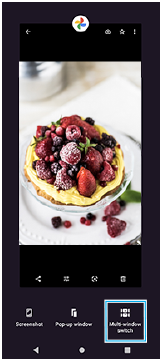 Kuva, joka näyttää moni-ikkunatilan kytkinpainikkeen sijainnin alhaalla oikealla.