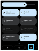 Imagem que mostra o ícone Definições na parte inferior direita do painel de Definições rápidas.