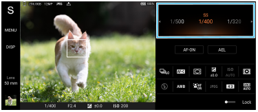 Obraz przedstawiający położenie pokrętła na ekranie gotowości aplikacji Photo Pro w trybie Priorytet szybkości migawki.