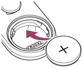 Illustration showing how to insert a lithium coin cell battery (CR2032) so that the plus terminal is facing upward